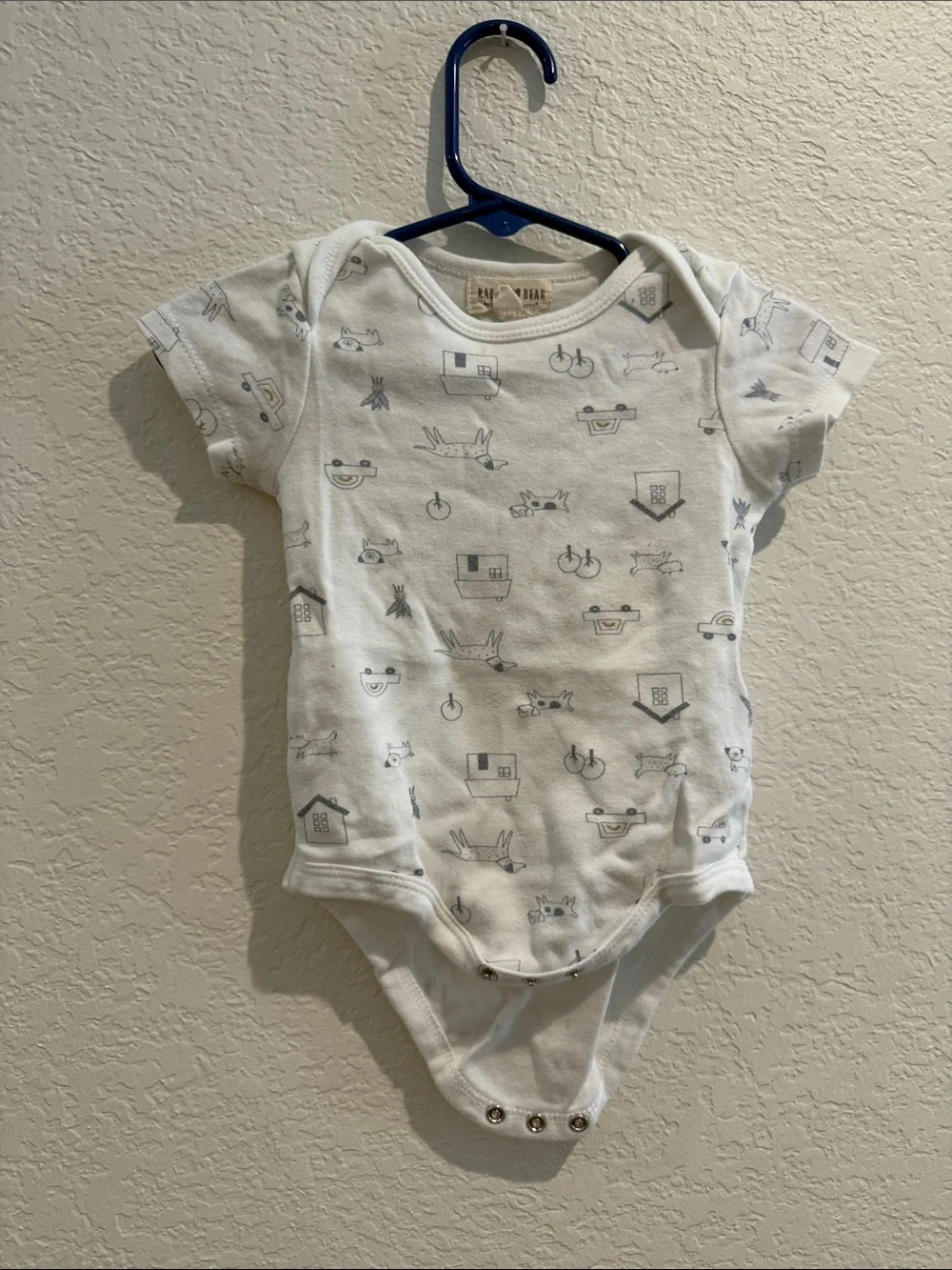 Neutral White Cotton Baby One-Piece with Gray Print